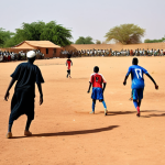 Nigerien Football Match**

"A vibrant scene of a football match in Niger, West Africa. The players are fully clothed in modest sports attire, playing on a dusty pitch. Cheering crowds surround the field. In the background, traditional mud-brick houses are visible under a bright, sunny sky. Safe for work, appropriate content, family-friendly, professional photography, perfect anatomy, correct proportions, natural pose, high quality."

**