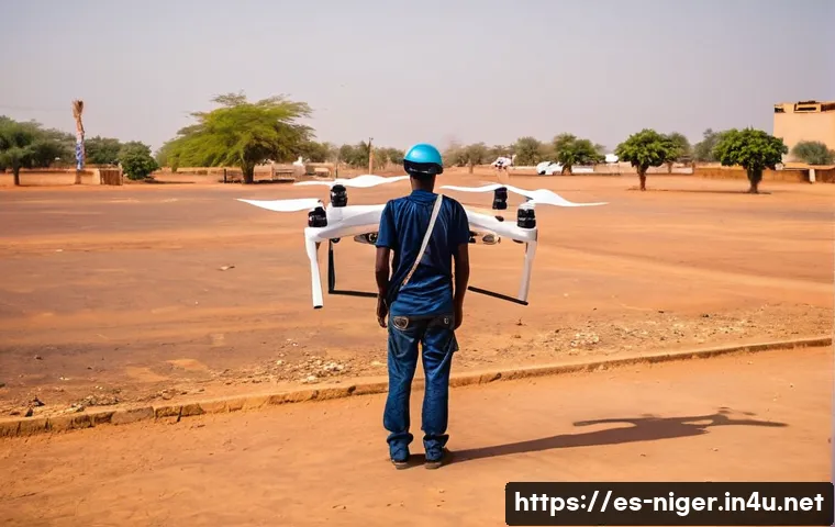 니제르에서 드론 사용 가능 여부 - A professional drone operator in Niamey, Niger, preparing for flight near an urban area with visible...